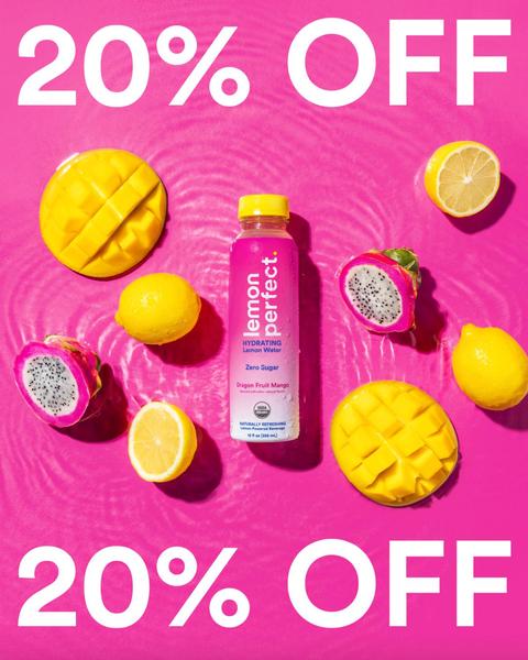 A square format ad featuring a bottle of lemon water surrounded by vibrant citrus and dragon fruit slices on a bright pink background.